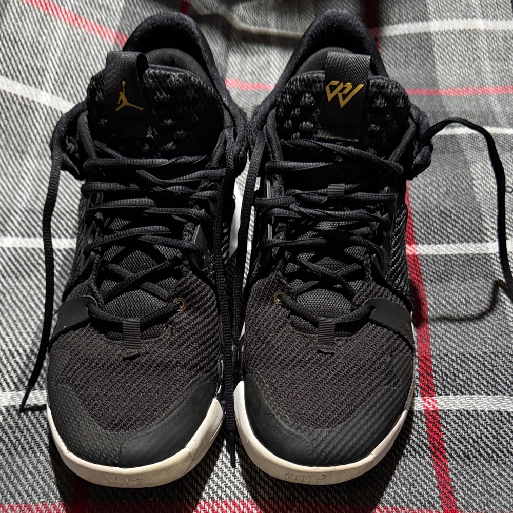 Jordan Black and Gold Athletic Shoes
